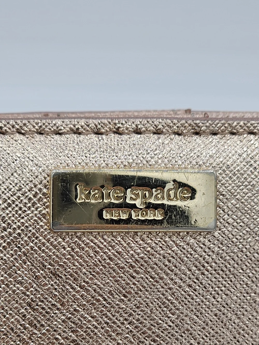 KATE SPADE Metallic Rose Gold Slim Bifold Wallet‎